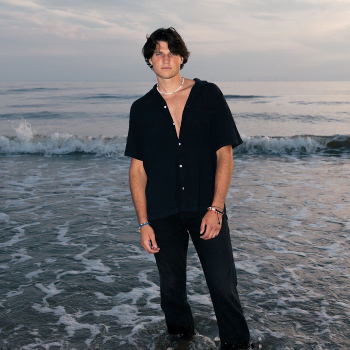 Persfoto van Sven Cilliers op het strand